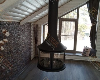 Компактный подвесной камин со стеклом в деревянном доме - Bordelet LEA 998
